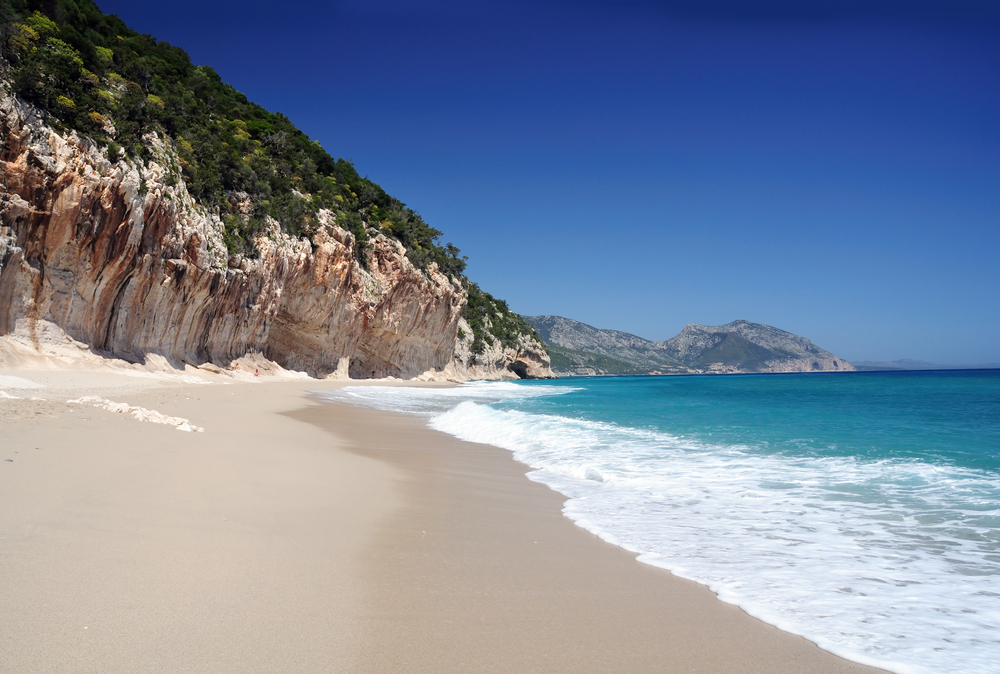 zand strand sardinie meenemen